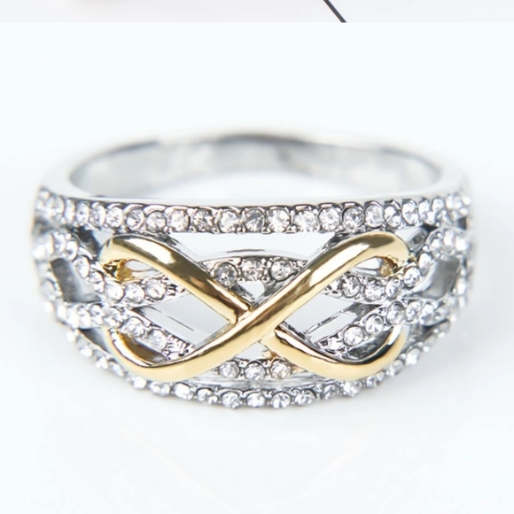 Jewelry - DONATED NWOT Infinity ring / wedding band